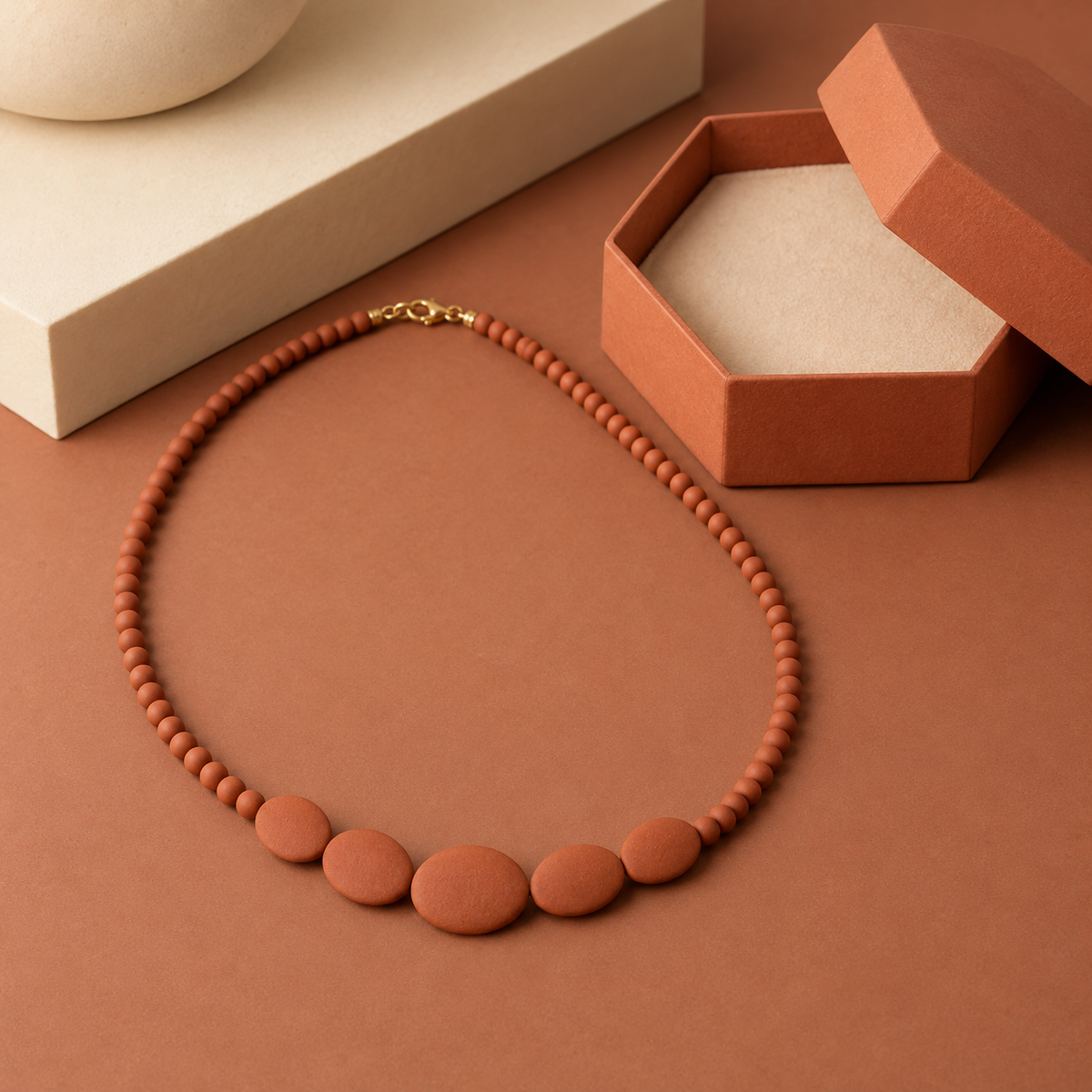 Terracotta-Colored Bead Necklace with Graduated Oval Center