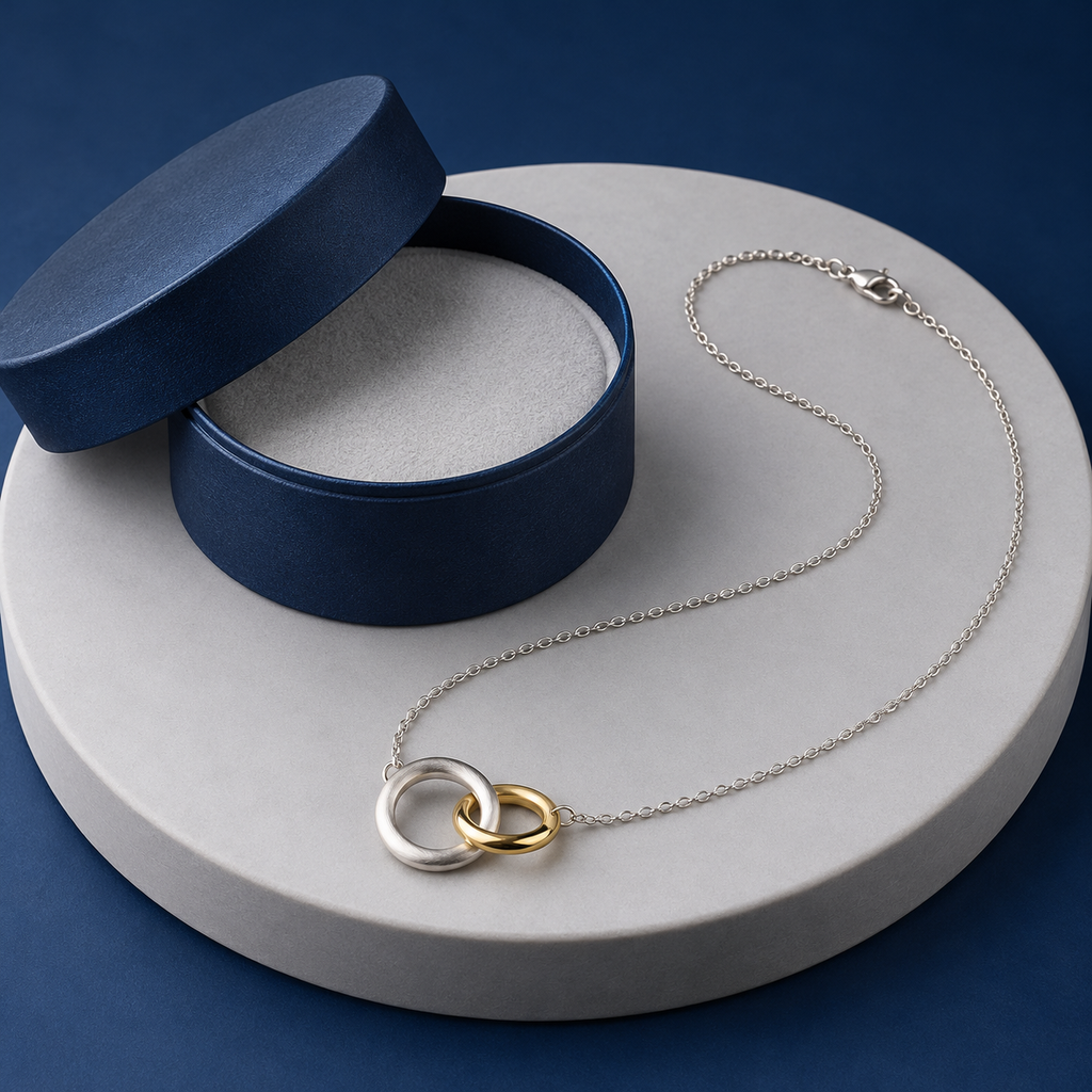 Two-Tone Orbit Necklace with Interlocked Unequal Rings