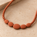 Terracotta-Colored Bead Necklace with Graduated Oval Center