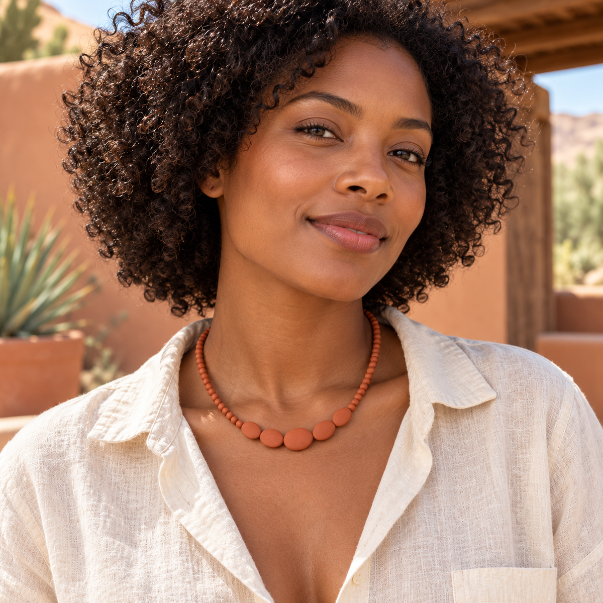 Terracotta-Colored Bead Necklace with Graduated Oval Center